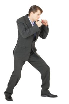 A man in a combat stance, isolated on a white background