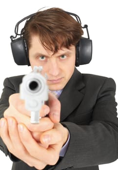 Businessman aiming a gun, isolated on a white background