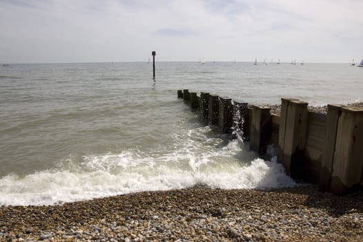 Groyne leading into the sea on a cold day