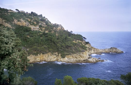 The Mediterranean sea carves jagged cliffs from Spain's Costa Brava.