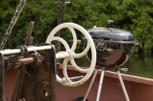 A wheel a gears of a winch on aboat