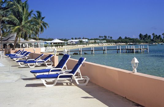 Empty deck chairs await vacationers in Great Exuma, the Bahamas.