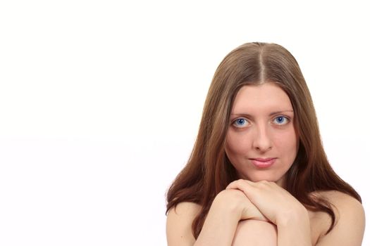 Portrait of the naked girl with blue eyes removed close up