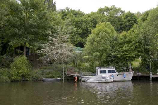 A small boat moored on the river medway