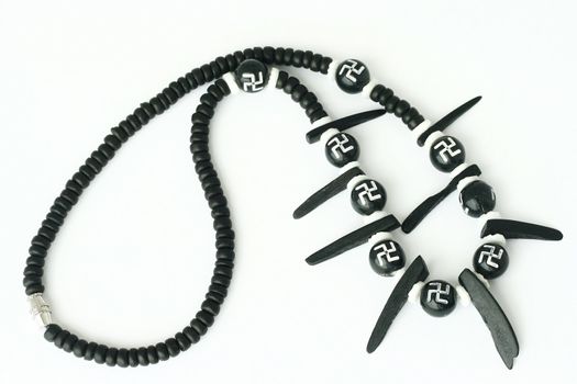 nice necklace native ornaments with nazi inscription in white background
 