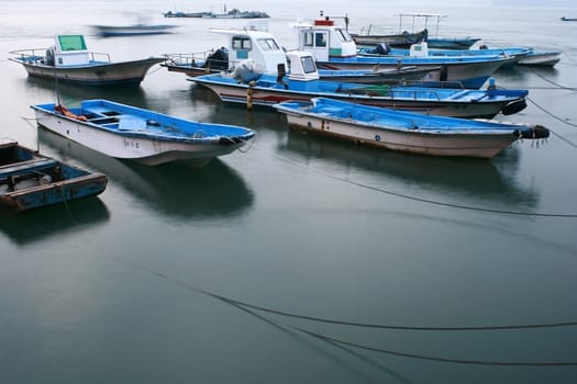 Beach image with fisherman boat at Taehan City in Korea
