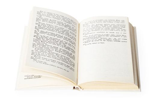 Open book lying on a white background
