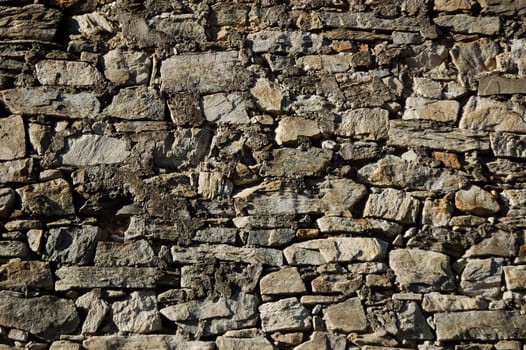 wall of a rural house made of stones (texture)