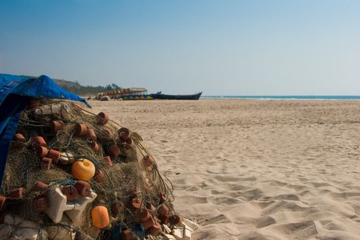 Fishing networks on beach sand