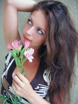 beautiful long-haired girl with flower