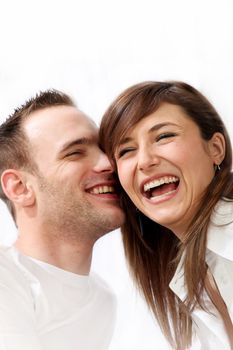 happy, young couple laughing together and is really happy