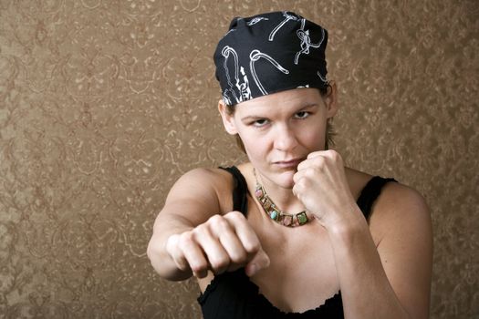 Pretty Boxing Woman Wearing a Bandana on Her Head