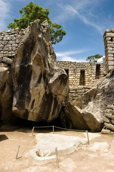 Machu Picchu  is a pre-Columbian Inca site located 2,400 meters (7,875 ft) above sea level. It is situated on a mountain ridge above the Urubamba Valley in Peru, which is 80 km (50 mi) northwest of Cusco. Often referred to as "The Lost City of the Incas", Machu Picchu is probably the most familiar symbol of the Inca Empire.