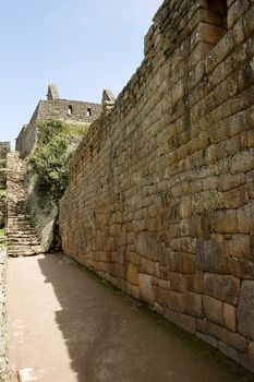 Machu Picchu  is a pre-Columbian Inca site located 2,400 meters (7,875 ft) above sea level. It is situated on a mountain ridge above the Urubamba Valley in Peru, which is 80 km (50 mi) northwest of Cusco. Often referred to as "The Lost City of the Incas", Machu Picchu is probably the most familiar symbol of the Inca Empire.