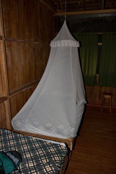 A mosquito net offers protection against mosquitos, flies, and other insects, and thus against diseases such as malaria.