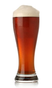 Cold glass of beer over white background