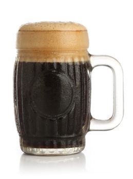 Fresh beer glass over white background