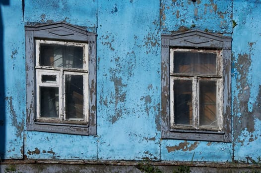 Pair of aged ruined urban window