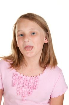 young girl poking out tongue  isolated on white