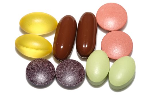 Several vitamin pills and capsules from above.
