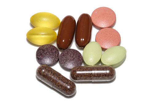 Several vitamin pills and capsules from above.
