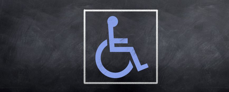 A blue wheelchair symbol is sketched on a blackboard