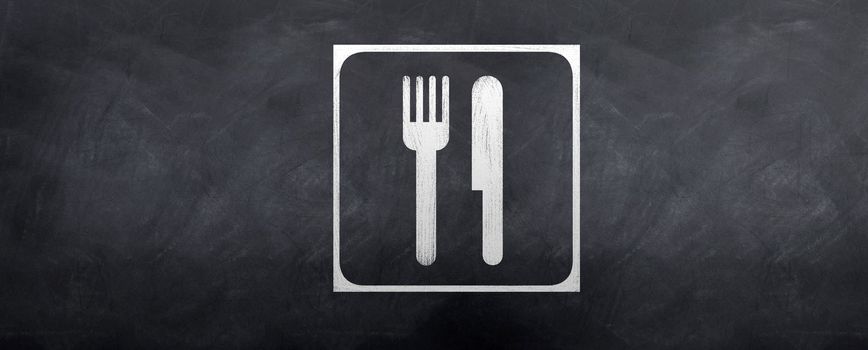 A knife and fork sketched on the blackboard with a bounding box