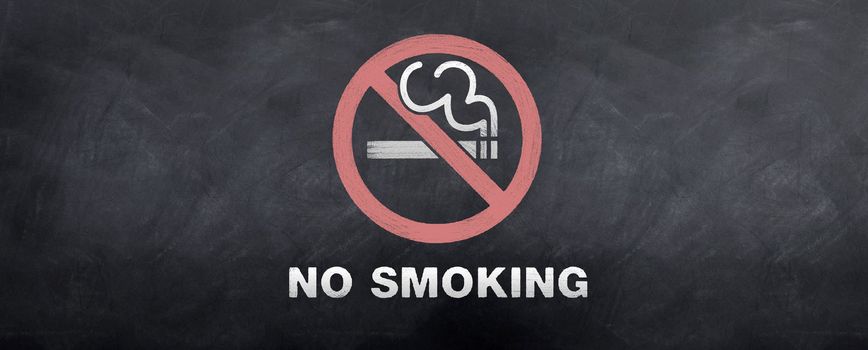 A no smoking sign symbol sketched on a blackboard