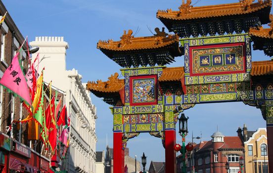 Chinese New Year celebrations in Liverpool UK 2008 with archway and colorful flags