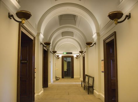 Elegant hallway with ornate arched ceiling