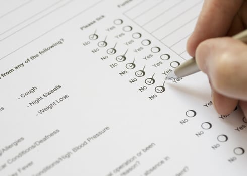 An job applicant completing a health questionnaire.
