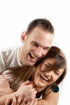Happy young couple laughing together and is really happy