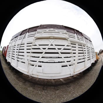 White railwaycar through fish eye