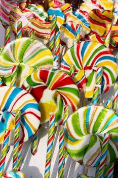 Many colorful lollipops sweet candy