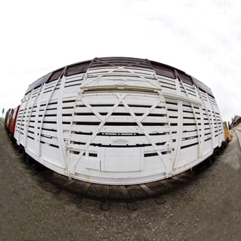 White railway car through fish eye