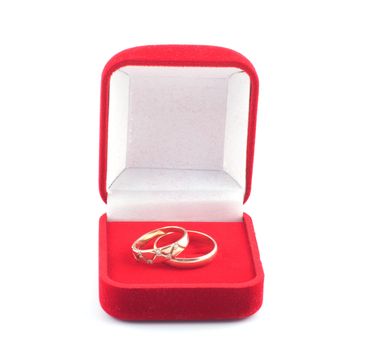 Red box with two gold wedding rings on a white background.