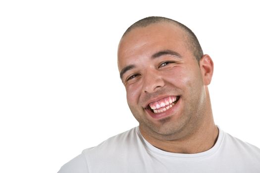 Casual portrait of a young man smiling, over white background.