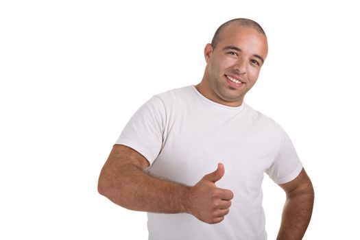 Casual portrait of a young man smiling, giving an ok sign, over white background.