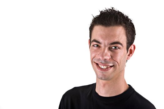 Casual portrait of a young man smiling, over white background.