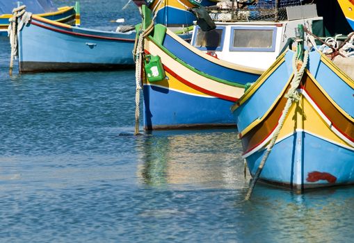 Traditional fishing boats of Malta in the fishing village of Marsaxlokk