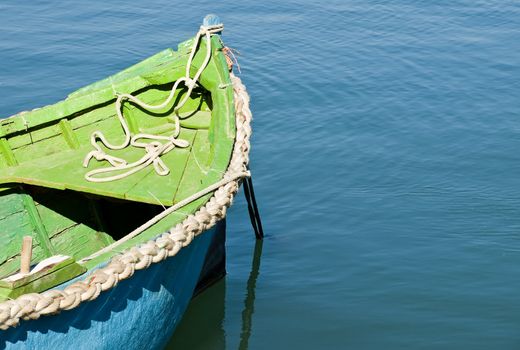 An old and battered boat in the fishing village of Marsaxlokk