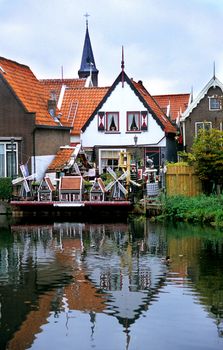 Miniature windmills decorate a house in Volendam, The Netherlands.