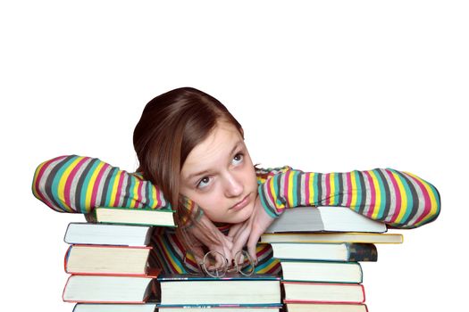 Sad girl portrait with stack of books. Isolated on white with clipping path