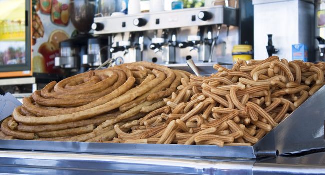 Churros, typical Spanish pastry, eaten for breakfast dipped in hot chocolate.