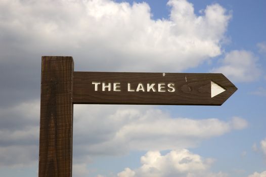 A sign post to the lakes