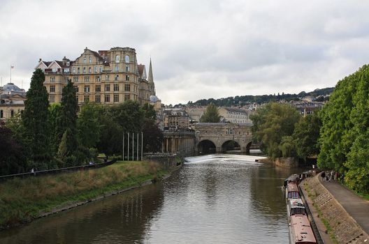 View of Bath and River Avon: Pultney Bridge, the Empire, riverside walk.