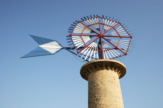 Antique windmill on the island of Mallorca in Spain