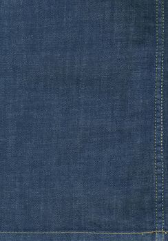 Flat background image of dark blue denim fabric with seams - large XXL high resolution image