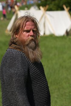 Photo of the viking on a battlefield. The dramatized representation. Role game