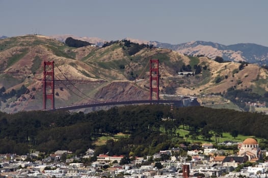 A shot of the Golden Gate Bridge taken from the top of the Twin Peaks
